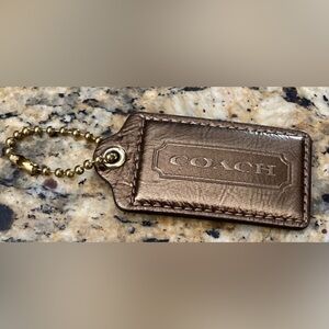 Coach Metallic Bronze Hangtag